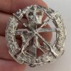 Small Arms School Staybrite Anodised Cap Badge - Staybright